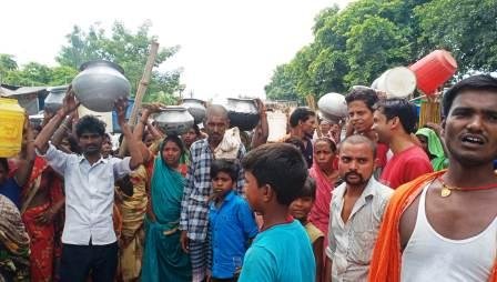 Troubled by the water problem the villagers blocked the road near Mahmadpur village 1