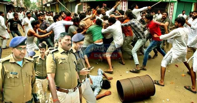 बिहारशरीफ में दो राजनीतिक गुटों में हिंसक झड़प, एक कार्यकर्ता के माथा में लगी गोली Violent clash between two political groups in Bihar Sharif, one worker shot in the head